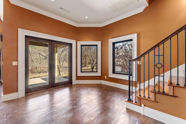 entryway featuring baseboards, visible vents, dark wood-style floors, stairs, and french doors