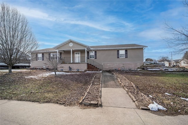 view of front of home featuring covered porch