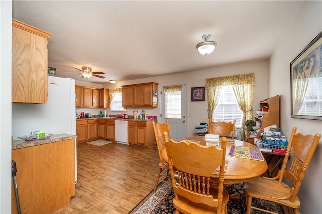 410 Paradise Heights Dr, Berryville, AR 72616 - dining room with light wood-style flooring and a ceiling fan