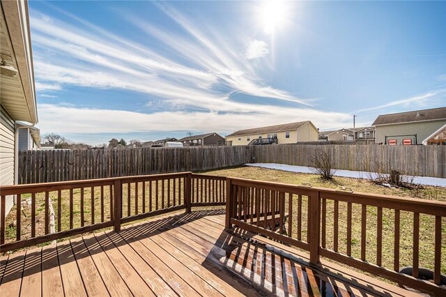410 Paradise Heights Dr, Berryville, AR 72616 - wooden terrace featuring a residential view, a fenced backyard, and a yard