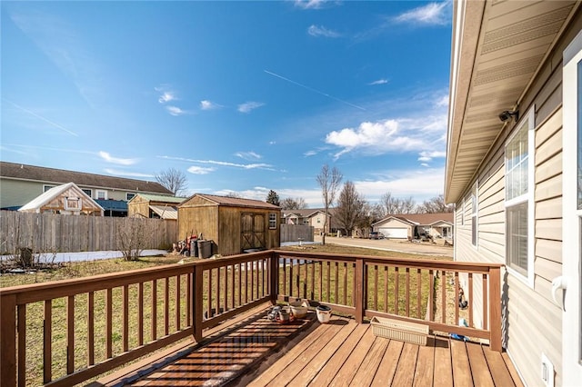 410 Paradise Heights Dr, Berryville, AR 72616 - wooden terrace with a yard, a storage unit, fence, a residential view, and an outdoor structure