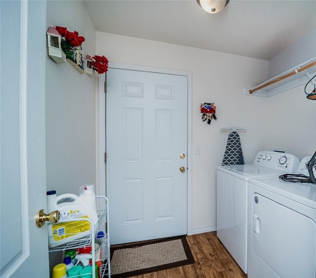 410 Paradise Heights Dr, Berryville, AR 72616 - washroom featuring washing machine and dryer, laundry area, and wood finished floors