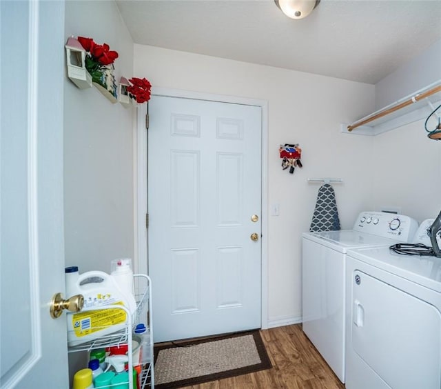 410 Paradise Heights Dr, Berryville, AR 72616 - laundry area with light wood-style floors, laundry area, and washer and clothes dryer