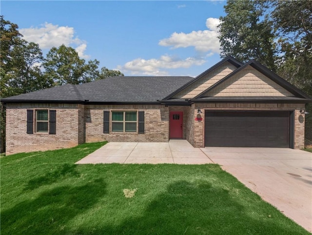 view of front of property featuring brick siding, a shingled roof, a front lawn, a garage, and driveway