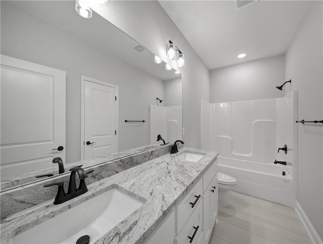 full bath featuring shower / bathtub combination, double vanity, a sink, and toilet