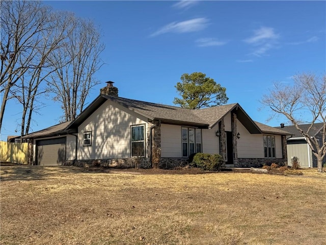 916 S 25th Pl, Rogers, AR 72758 - view of front of property with a garage, a chimney, and stone siding