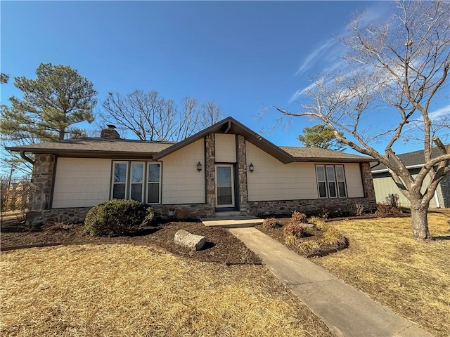 916 S 25th Pl, Rogers, AR 72758 - ranch-style house featuring stone siding, a chimney, and a front yard