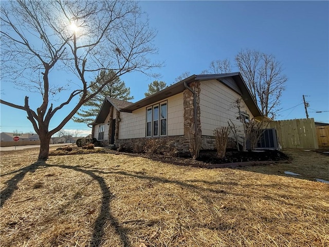 916 S 25th Pl, Rogers, AR 72758 - view of side of home featuring stone siding