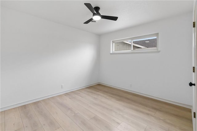 916 S 25th Pl, Rogers, AR 72758 - spare room with light wood-style flooring and ceiling fan