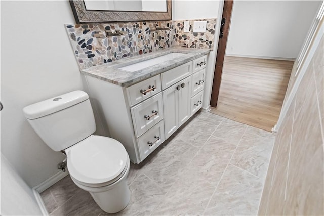 916 S 25th Pl, Rogers, AR 72758 - half bathroom with vanity and backsplash