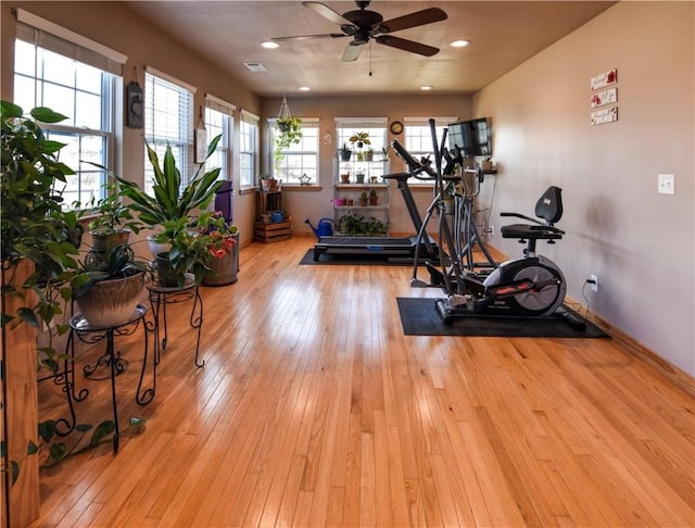 exercise room with ceiling fan, hardwood / wood-style floors, recessed lighting, and baseboards