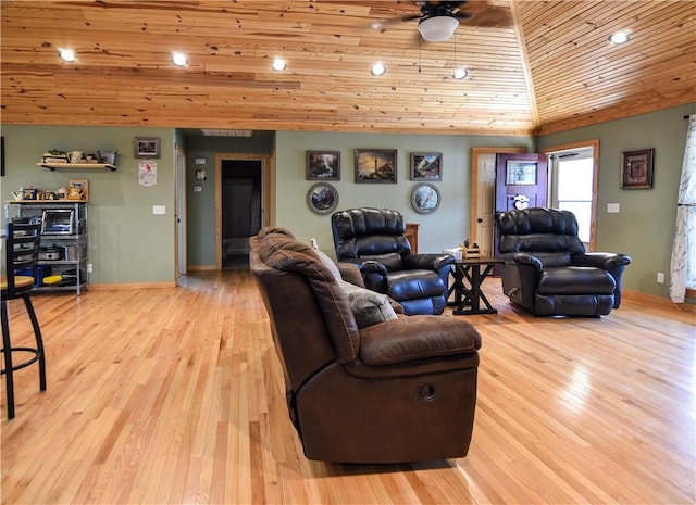 living area with baseboards, a ceiling fan, wooden ceiling, light wood-style flooring, and vaulted ceiling