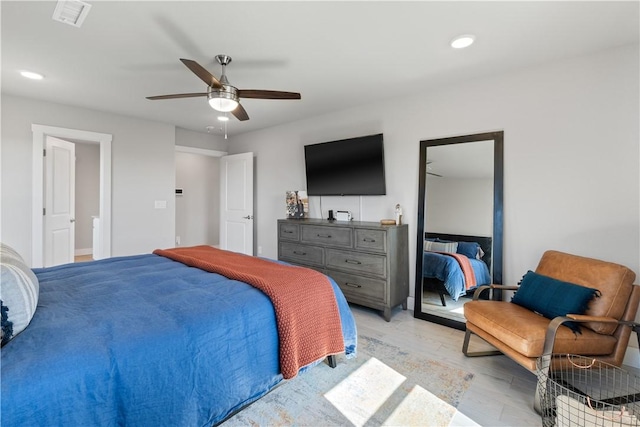 bedroom featuring a ceiling fan, light wood-type flooring, visible vents, and recessed lighting