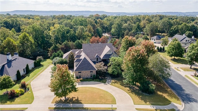 bird's eye view featuring a view of trees