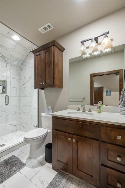 full bathroom featuring marble finish floor, visible vents, toilet, a stall shower, and vanity