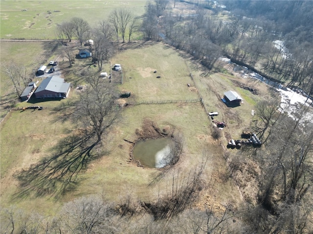 bird's eye view featuring a water view and a rural view