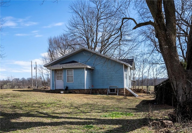 19407/19403 Dawn Hill E Rd, Gentry, AR 72734 - view of side of home with a lawn