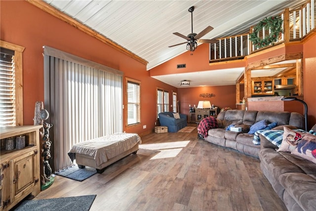 19407/19403 Dawn Hill E Rd, Gentry, AR 72734 - living room featuring visible vents, a ceiling fan, high vaulted ceiling, and hardwood / wood-style flooring