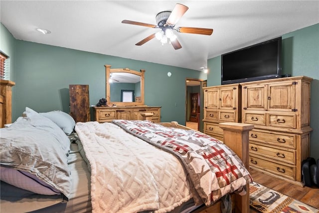 19407/19403 Dawn Hill E Rd, Gentry, AR 72734 - bedroom featuring ceiling fan and wood finished floors