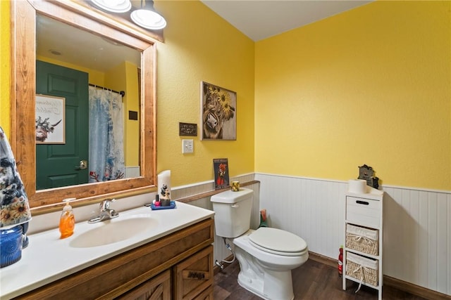 19407/19403 Dawn Hill E Rd, Gentry, AR 72734 - full bathroom featuring toilet, wainscoting, wood finished floors, and vanity