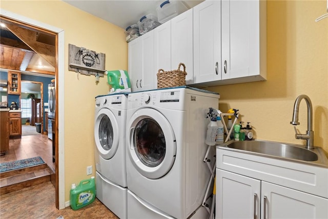 19407/19403 Dawn Hill E Rd, Gentry, AR 72734 - washroom with a sink, cabinet space, and washer and dryer
