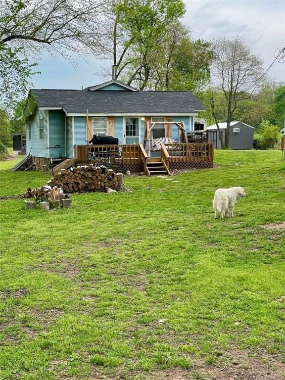 19407/19403 Dawn Hill E Rd, Gentry, AR 72734 - back of property with a lawn, a wooden deck, and a shingled roof