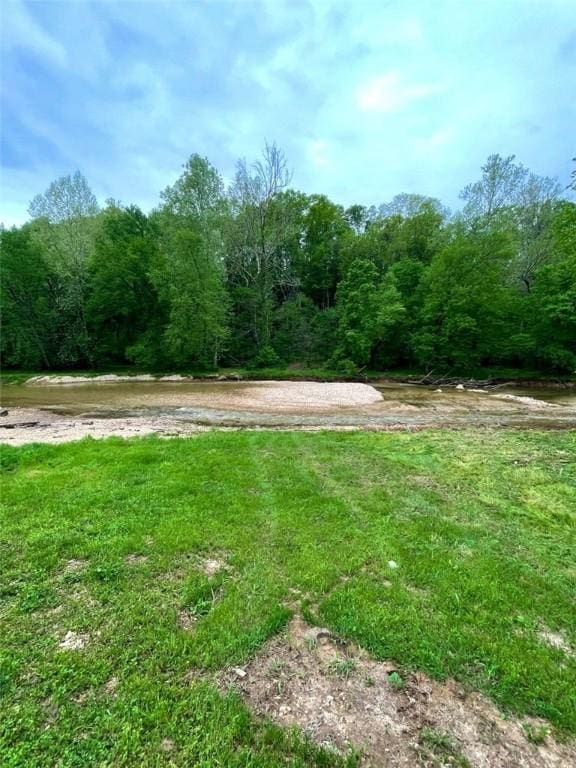 19407/19403 Dawn Hill E Rd, Gentry, AR 72734 - view of yard featuring a view of trees