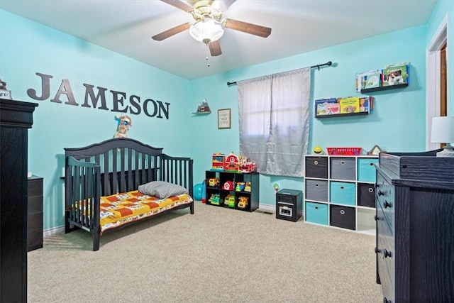 bedroom featuring carpet floors, ceiling fan, and baseboards