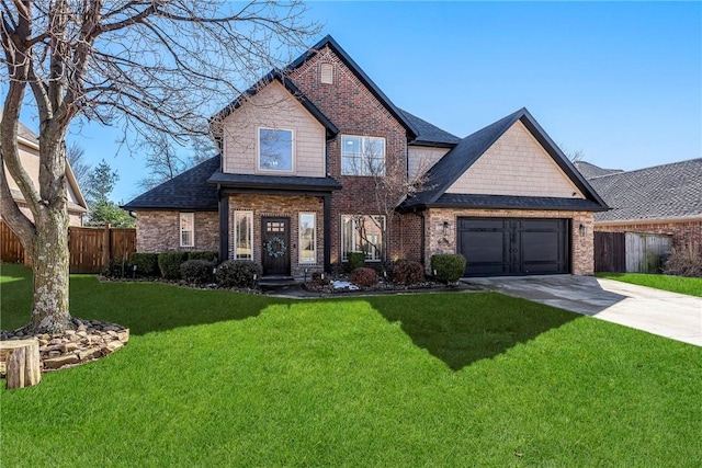 craftsman-style house featuring an attached garage, brick siding, fence, concrete driveway, and a front lawn