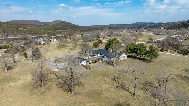 drone / aerial view featuring a mountain view