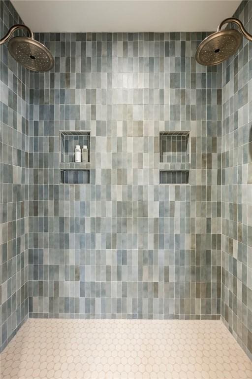 445 NW C St, Bentonville, AR 72712 - bathroom featuring tiled shower