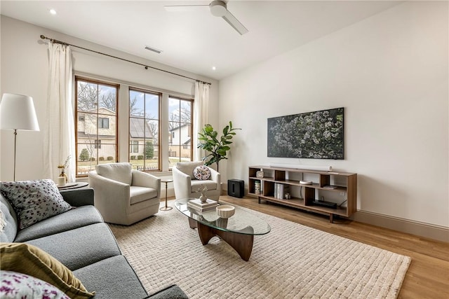 445 NW C St, Bentonville, AR 72712 - living room featuring wood finished floors, ceiling fan, and recessed lighting