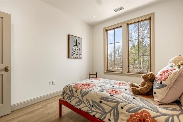 445 NW C St, Bentonville, AR 72712 - bedroom featuring light wood-style flooring and recessed lighting