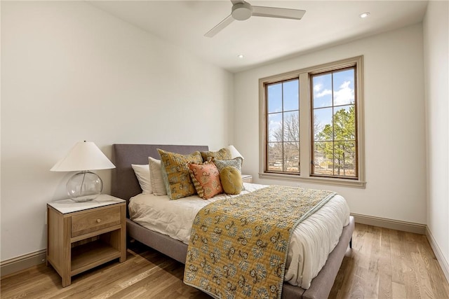 445 NW C St, Bentonville, AR 72712 - bedroom with light wood-type flooring, recessed lighting, and ceiling fan