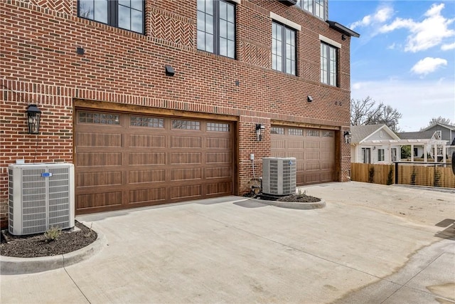 445 NW C St, Bentonville, AR 72712 - garage with concrete driveway