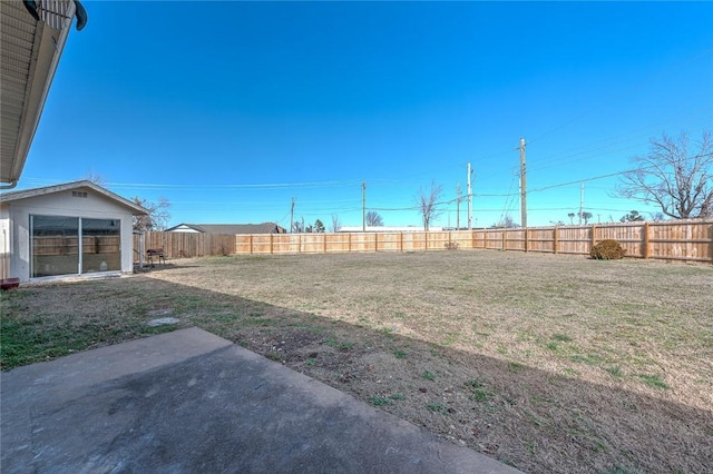 view of yard featuring a fenced backyard and a patio