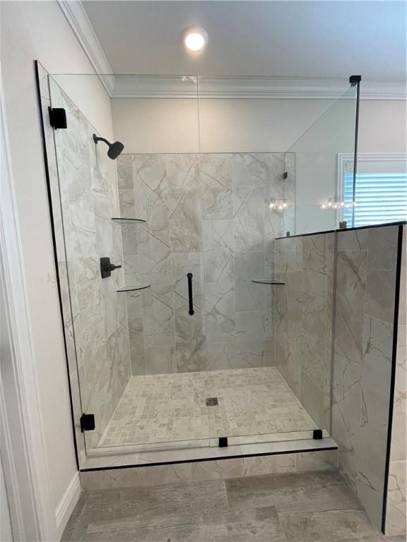 full bathroom with ornamental molding and a shower stall