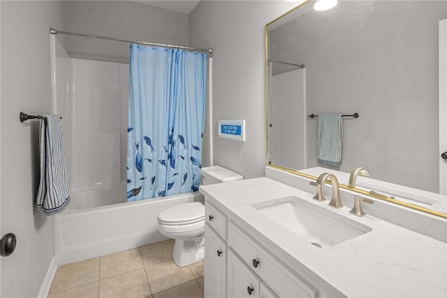 full bath featuring toilet, shower / tub combo, vanity, and tile patterned floors