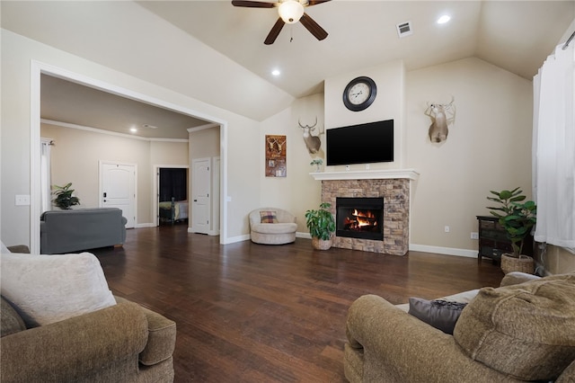 living room with a fireplace, vaulted ceiling, visible vents, and ceiling fan
