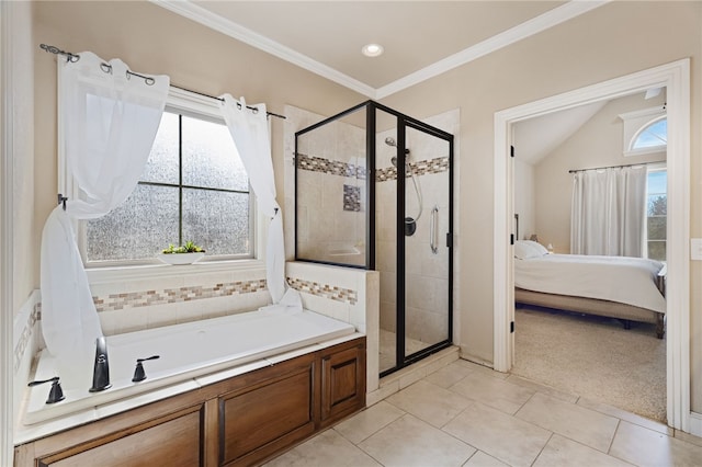 ensuite bathroom with a shower stall, connected bathroom, and plenty of natural light