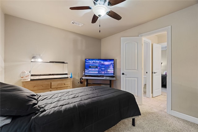 bedroom with carpet floors, a ceiling fan, visible vents, and baseboards