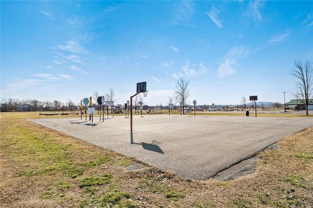 view of home's community featuring community basketball court