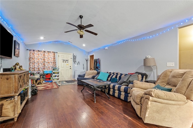 living room featuring lofted ceiling, ceiling fan, and dark wood finished floors