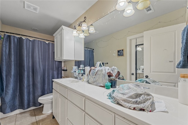 full bathroom featuring visible vents, vanity, toilet, and tile patterned floors