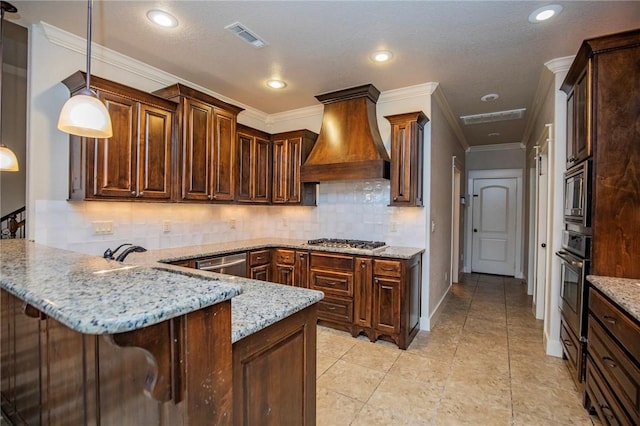 kitchen featuring appliances with stainless steel finishes, custom exhaust hood, visible vents, and light stone countertops