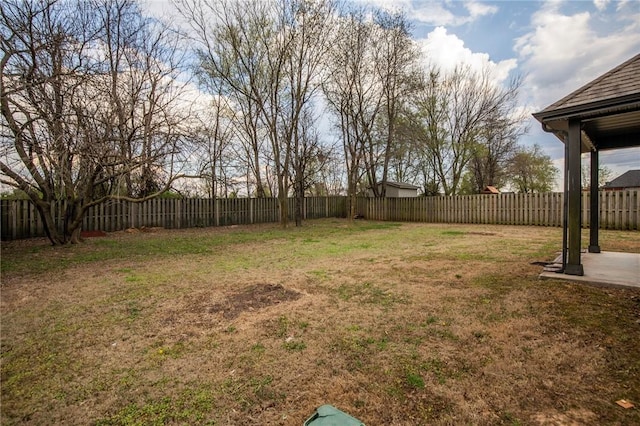 view of yard featuring a fenced backyard