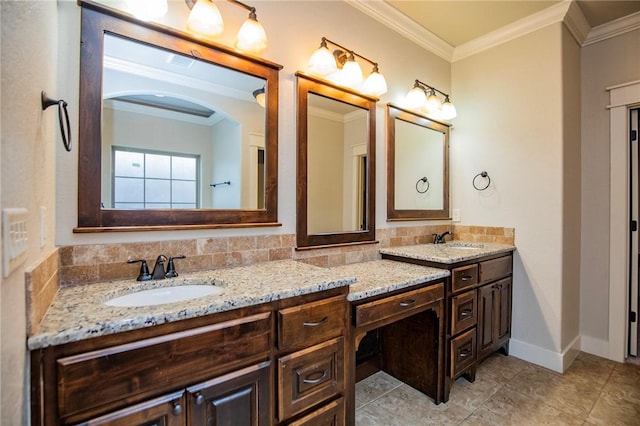 bathroom with double vanity, backsplash, a sink, and crown molding