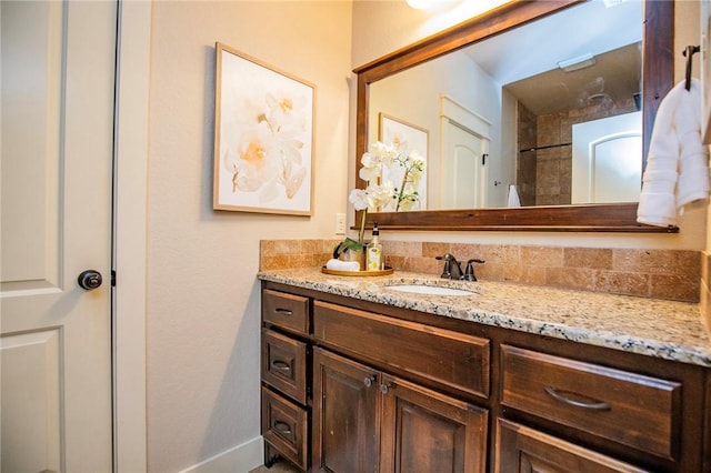 3601 SW Willowbrook Rd, Bentonville, AR 72713 - bathroom featuring baseboards and vanity