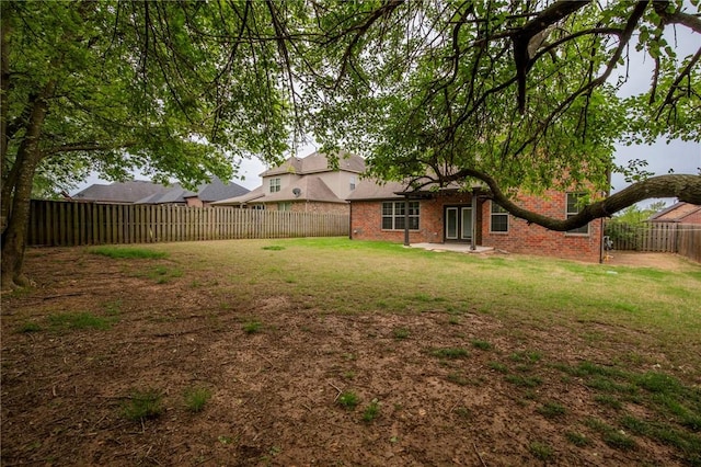 3601 SW Willowbrook Rd, Bentonville, AR 72713 - view of yard featuring a fenced backyard and a patio