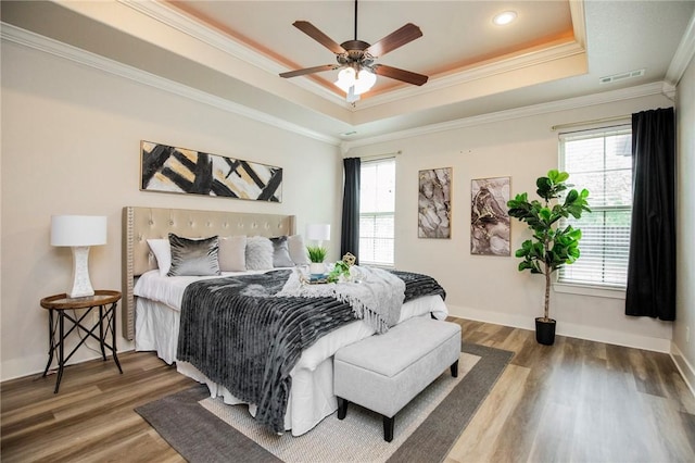 3601 SW Willowbrook Rd, Bentonville, AR 72713 - bedroom with ornamental molding, a raised ceiling, and multiple windows